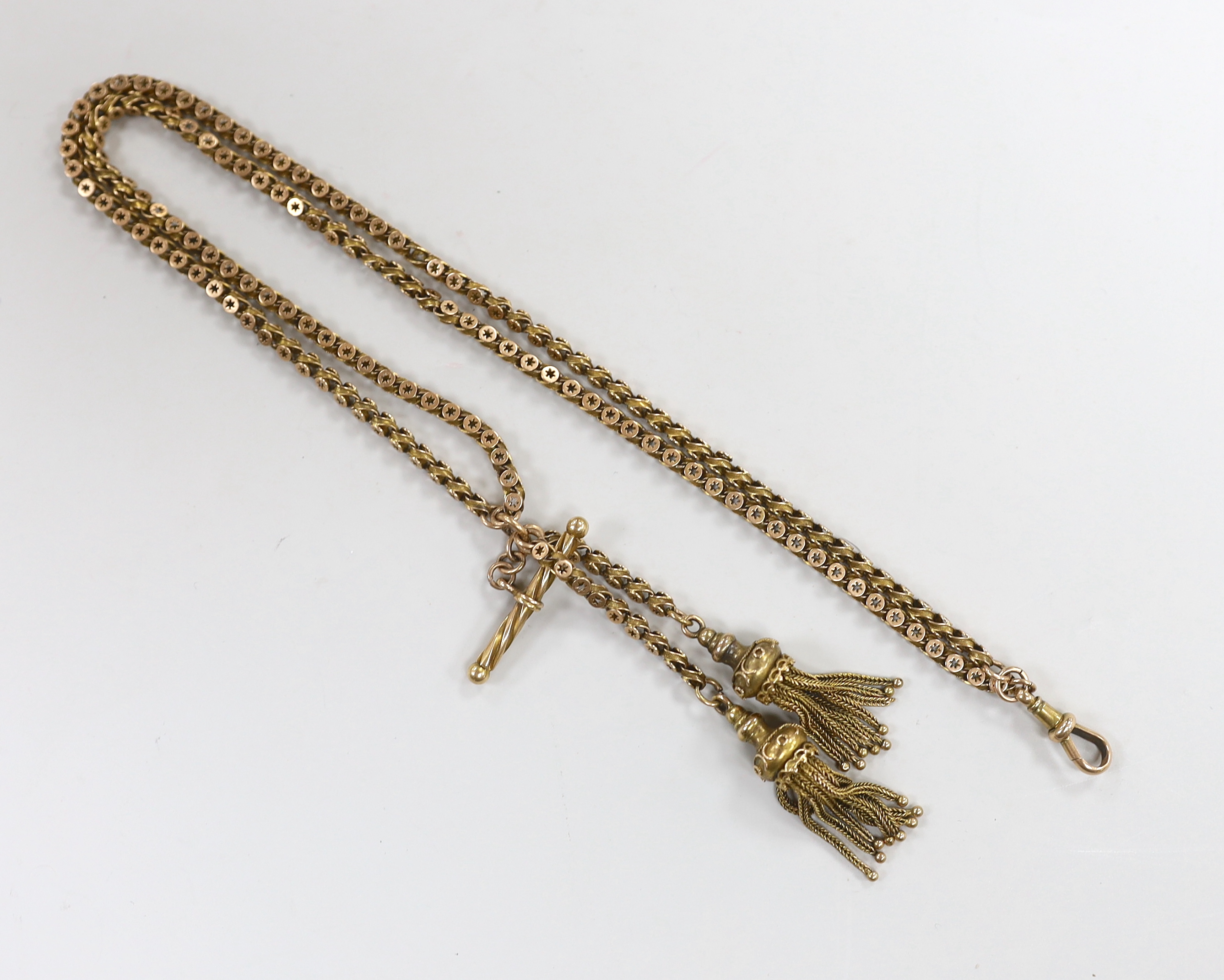 An Edwardian pierced 15c fancy link double strand albertina, with tassel drops, 38cm, 27.9 grams.